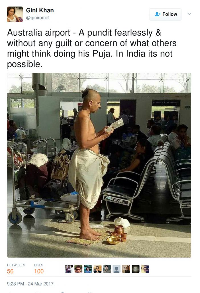 Australia airport - A pundit fearlessly & without any guilt or concern of what others might think doing his Puja. In India its not possible.