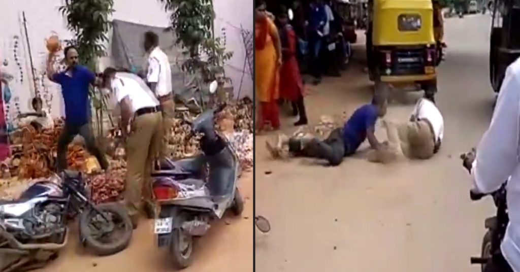 कर्नाटक का पुराना वीडियो, ट्रैफिक जुर्माने की वजह से पुलिस पर हमला बताकर साझा