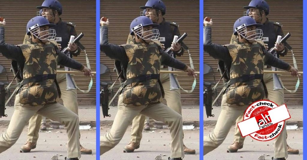 Old photograph of UP police personnel throwing a stone shared as Delhi police